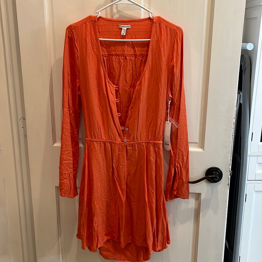 Blood Orange Dress, cut out in the back.